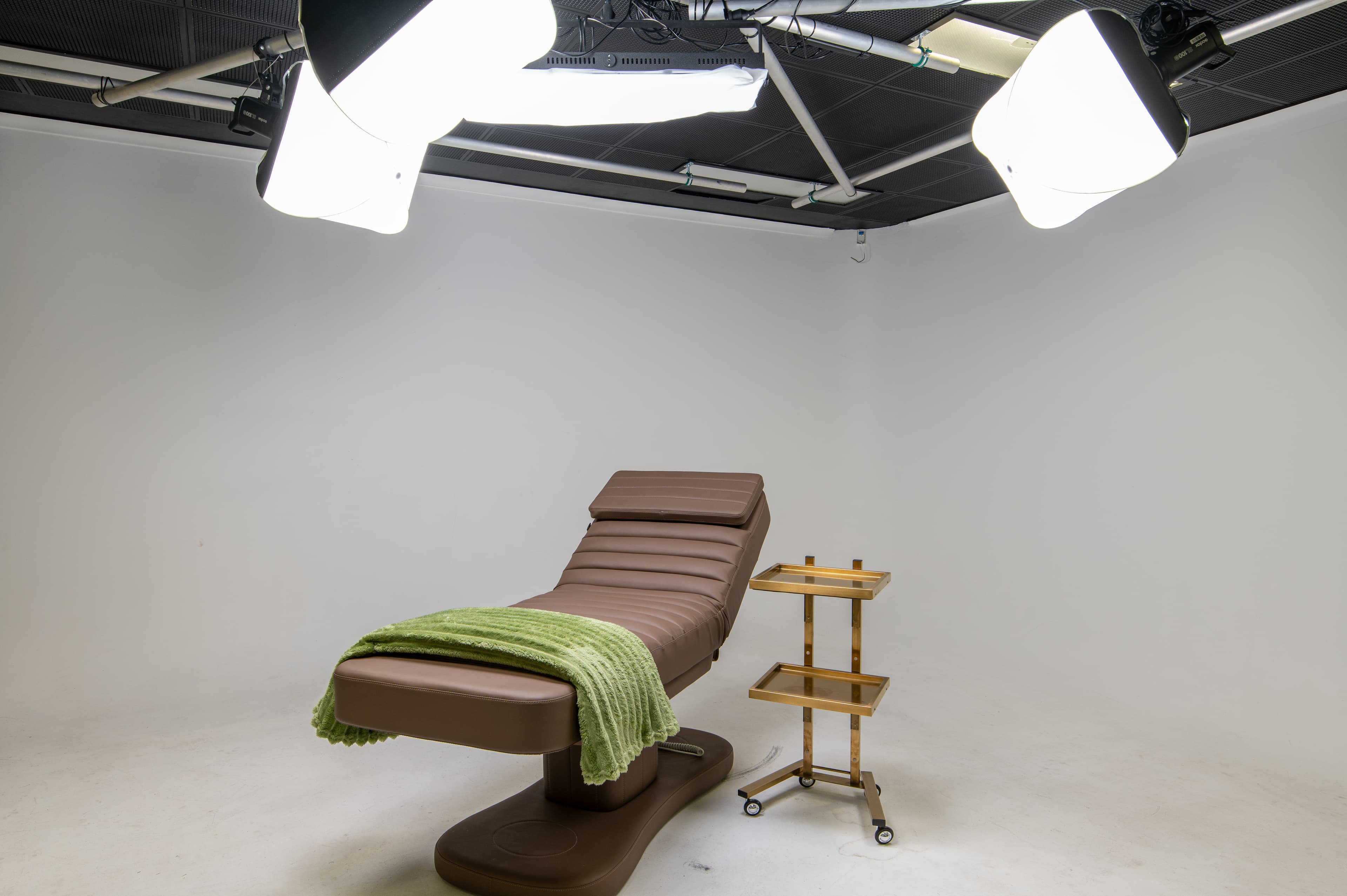 Creative studio with professional lighting and white cyclorama